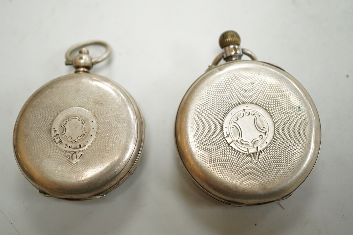 A late Victorian silver 'Improved Patent' open faced pocket watch, with Roman dial and subsidiary seconds, together with four other silver or white metal pocket/fob watches and three base metal chain sections.